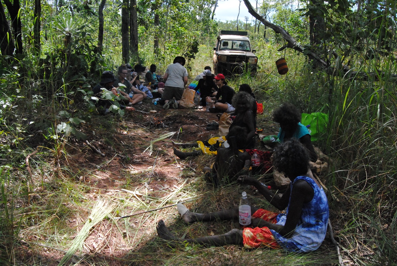 Bula’bula weavers and students sitting in the bush for a weaving workshop.