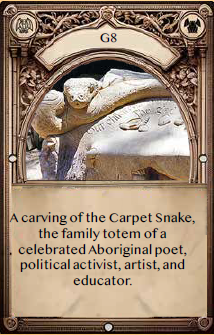 G8 - A carving of a Carpet Snake.