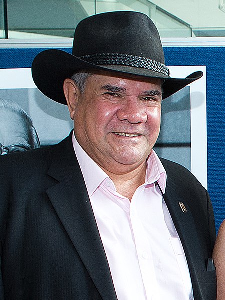 Mick Dodson smiling at the camera.