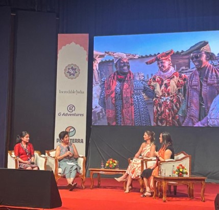 Aayusha Prasain (left) speaks during the "Women and Community Tourism" panel at the World Community Tourism Summit, GX India—a global event by G Adventures powered by Planeterra, celebrating the transformative power of community tourism.