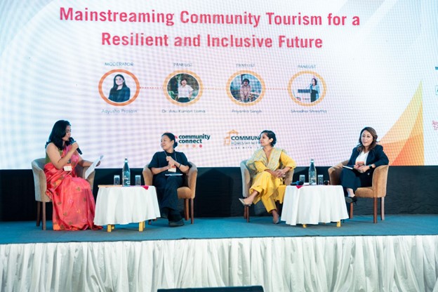 Aayusha Prasain moderates a panel discussion with representatives from ICIMOD, Planeterra, and Nepal Tourism Board on mainstreaming community tourism during the Community Connect 2025 Concluding Event.