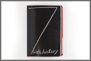 The heading page for the seventh chapter, “with history”, written in chalk on a blackboard