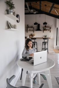 Woman using a computer at a desk