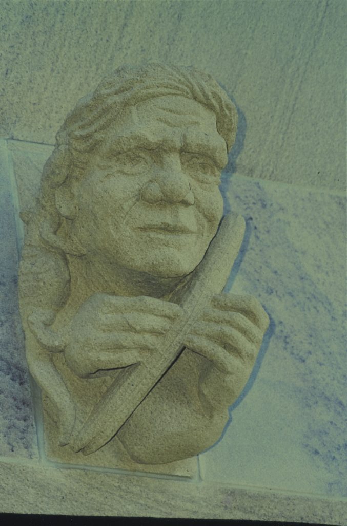 Sandstone haut-relief grotesque of Willie (Gaiarbau) Mackenzie